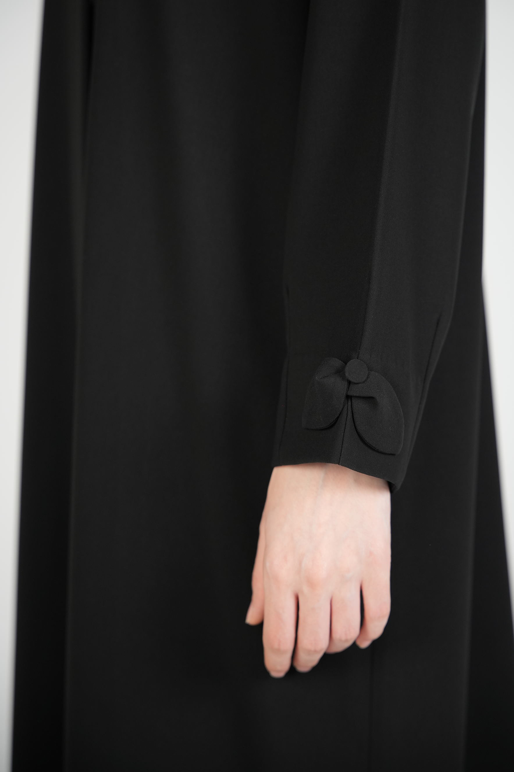 Black Nova Crepe Abaya with Appliqué Bow Details on Sleeves - Posh Abaya