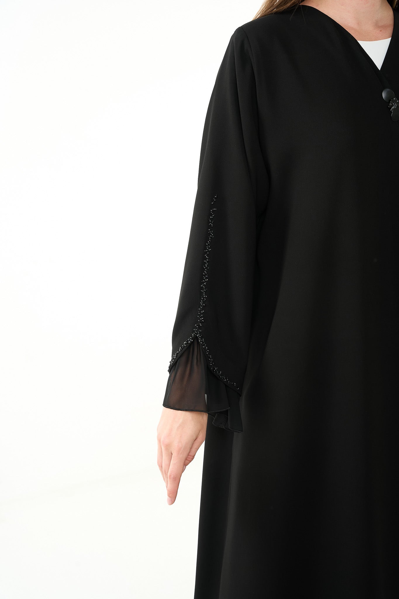 Black Claire Crepe Abaya with Overlap Pleats and Mixed Beadwork on Chiffon Sleeves - Posh Abaya