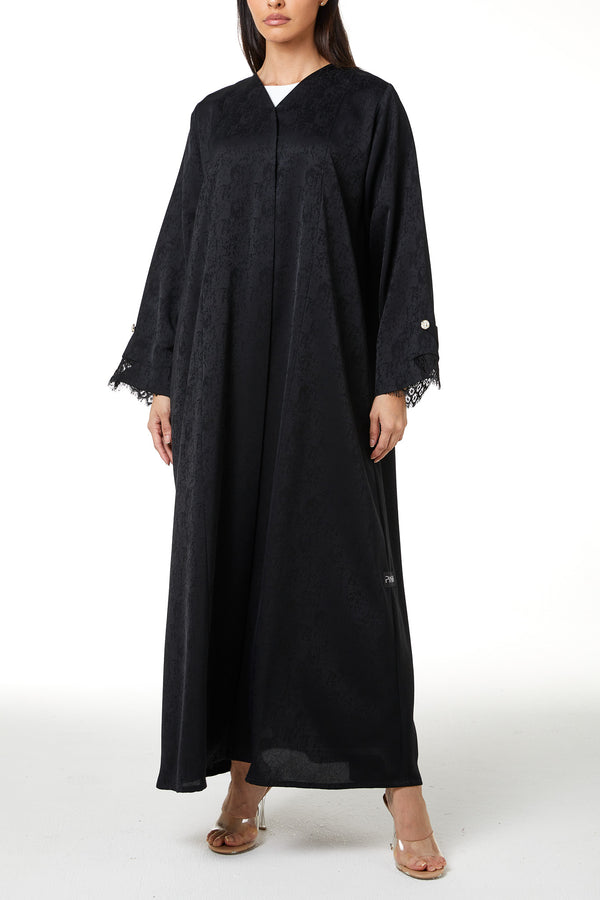 Black zeta jaquard Abaya featuring a soft woven feel