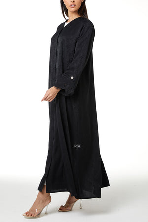 Black zeta jaquard Abaya featuring a soft woven feel