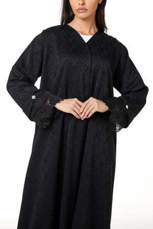 Black zeta jaquard Abaya featuring a soft woven feel