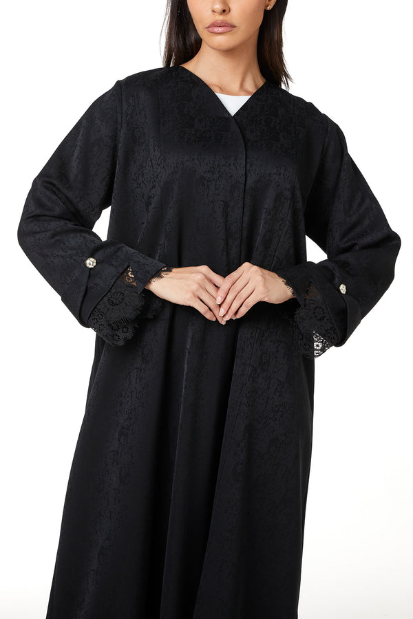 Black zeta jaquard Abaya featuring a soft woven feel