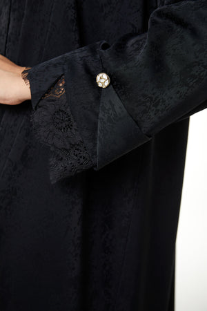Black zeta jaquard Abaya featuring a soft woven feel