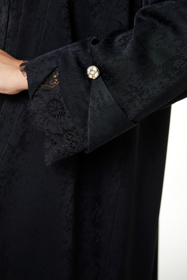 Black zeta jaquard Abaya featuring a soft woven feel