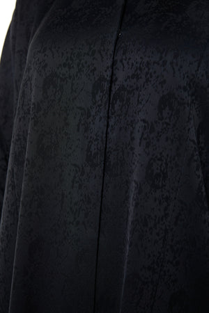 Black zeta jaquard Abaya featuring a soft woven feel