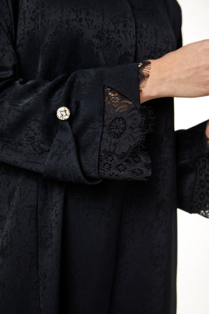 Black zeta jaquard Abaya featuring a soft woven feel