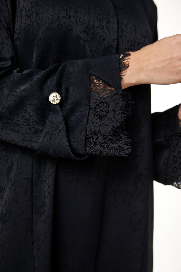 Black zeta jaquard Abaya featuring a soft woven feel
