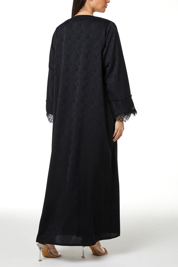 Black zeta jaquard Abaya featuring a soft woven feel